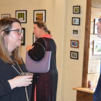 man and woman discuss